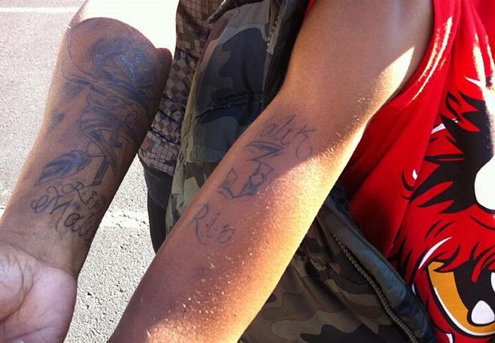 Женщину арестовали за разрешение 10-летнему сыну сделать татуировку (9 фото)