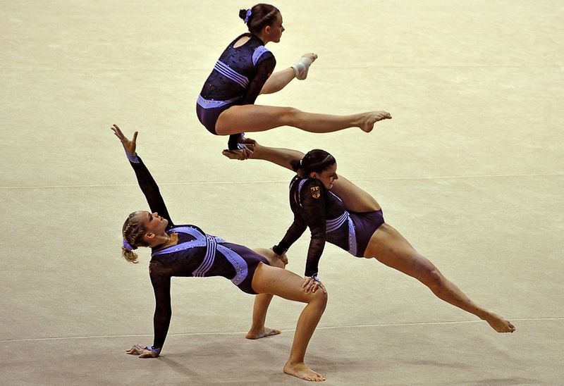 Немецкие гимнастки в групповом соревновании по акробатической гимнастике на Всемирных играх в г. Гаосюн 21 июля. (SAM YEH/AFP/Getty Images)