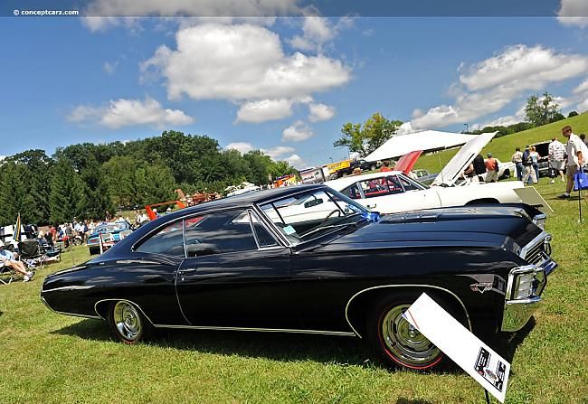 Размеры и вес. 1967 Chevrolet Impala колесная база 3023 мм. Длина 5417 мм. Ширина 2019 мм. Высота 1384 мм. <br>Дорожный просвет в 152 мм. Собственная масса 1755 кг. Запас топлива 90,9 литров